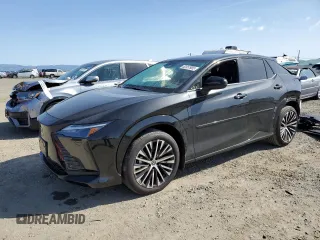 2024 Lexus RZ 300e Premium z VIN JTJABABB9RA004295, wystawiony jako Copart lot #52357905 z przebiegiem 7 344 mil mil oraz Szkoda całkowita • Salvage title. Historia ofert i sprzedaży dostępna na DreamBid. Obrazek 1.