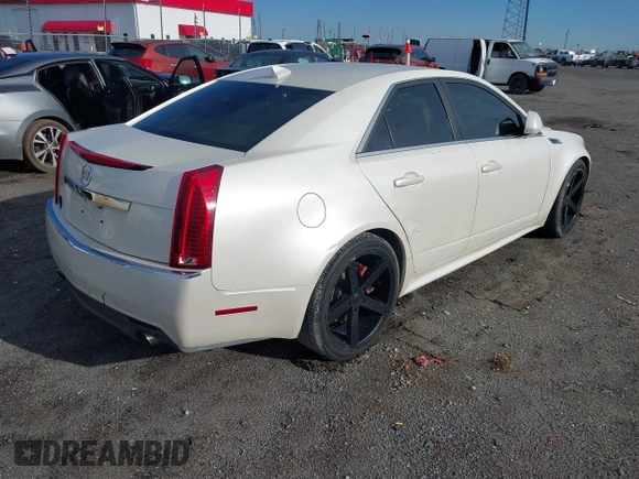 2010 Cadillac CTS Luxury with VIN 1G6DE5EG9A0140090, listed as a IAAI auction lot 42086562 with 230,280 mi miles. Bid and sale history available at carsss.com. Image 4.