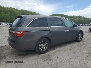 2013 Honda Odyssey EX-L with VIN 5FNRL5H67DB009743, listed as a Copart auction lot 55881595 with 232,658 mi miles and Clean Title. Bid and sale history available at DreamBid. Image 3.