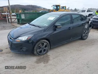 2014 Ford Focus SE with VIN 1FADP3F2XEL284465, listed as a IAAI auction lot 41903937 with 173,770 mi miles. Bid and sale history available at carsss.com. Image 2.