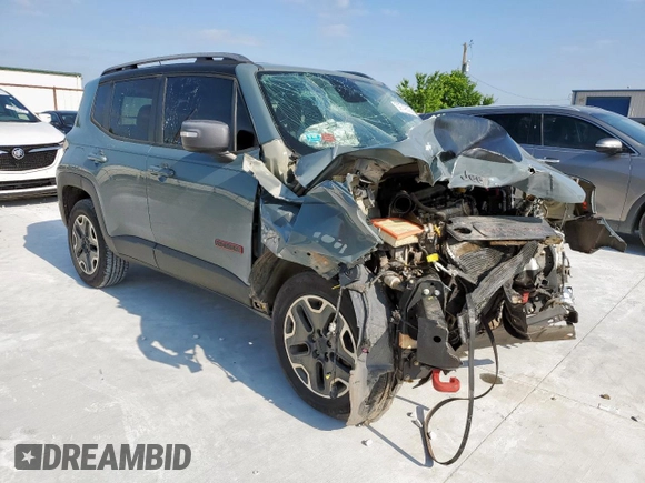 2015 Jeep Renegade Trailhawk with VIN ZACCJBCT7FPC17933, listed as a Copart auction lot 59749325 with Not provided miles and Salvage title. Bid and sale history available at DreamBid. Image 4.