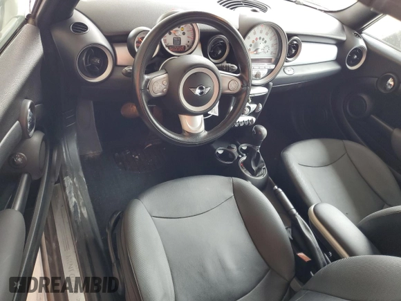 2010 MINI Convertible with VIN WMWMR3C59ATU98597, listed as a Copart auction lot 53336025 with 88,273 mi miles and Salvage Title. Bid and sale history available at DreamBid. Image 8.