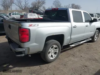 2014 Chevrolet Silverado 1500 LTZ with VIN 3GCUKSEC3EG273544, listed as a IAAI auction lot 41780391 with 125,135 mi miles. Bid and sale history available at carsss.com. Image 4.