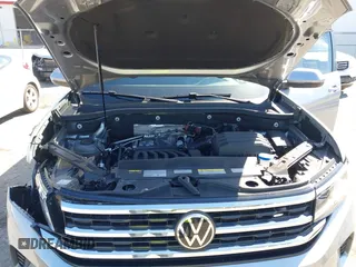 2022 Volkswagen Atlas SE z VIN 1V2HR2CA9NC518394, wystawiony jako IAAI lot #41702134 z przebiegiem 28 685 mil mil oraz . Historia ofert i sprzedaży dostępna na DreamBid. Obrazek 10.