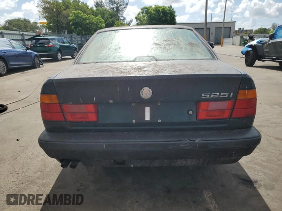 1994 BMW 5 Series 525i z VIN WBAHD632XRGK40231, wystawiony jako Copart lot #59364145 z przebiegiem Nie podano mil oraz Czysty tytuł • Clean title. Historia ofert i sprzedaży dostępna na DreamBid. Obrazek 6.