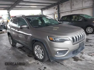 2019 Jeep Cherokee Latitude with VIN 1C4PJLCBXKD285182, listed as a IAAI auction lot 42087082 with 69,001 mi miles and . Bid and sale history available at DreamBid. Image 1.