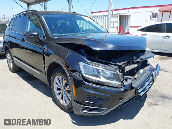 2018 Volkswagen Tiguan SEL z VIN 3VV3B7AX3JM210300, wystawiony jako IAAI lot #42189355 z przebiegiem 83 802 mil mil oraz . Historia ofert i sprzedaży dostępna na DreamBid. Obrazek 1.