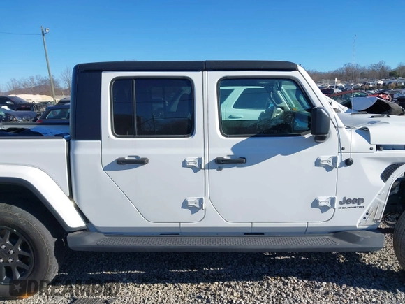 2023 Jeep Gladiator High Altitude with VIN 1C6HJTFG4PL560982, listed as a IAAI auction lot 41236477 with 28,835 mi miles and . Bid and sale history available at DreamBid. Image 13.