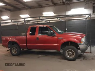 2002 Ford Super Duty F-250 XL with VIN 1FTNX21L82EA87027, listed as a IAAI auction lot 41893004 with 214,580 mi miles. Bid and sale history available at carsss.com. Image 13.