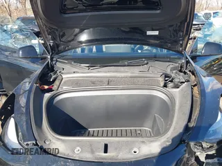 2024 Tesla Model Y with VIN 7SAYGDED5RF093018, listed as a IAAI auction lot 41747467 with 60,469 mi miles and . Bid and sale history available at DreamBid. Image 10.
