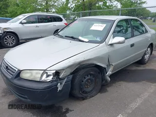 2001 Toyota Camry CE z VIN 4T1BG22K41U847401, wystawiony jako IAAI lot #42275762 z przebiegiem 202 936 mil mil oraz . Historia ofert i sprzedaży dostępna na DreamBid. Obrazek 17.