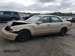 1998 Mazda 626 DX with VIN 1YVGF22CXW5733338, listed as a Copart auction lot 71796184 with 196,218 mi miles and Salvage Title. Bid and sale history available at carsss.com. Image 1.