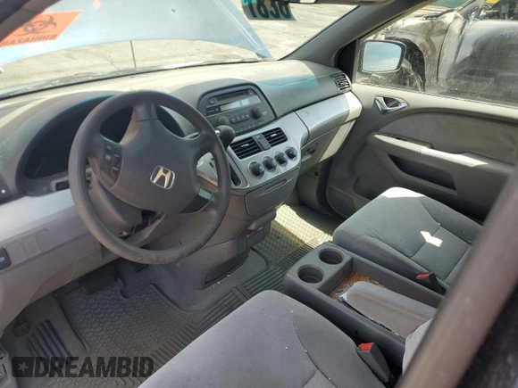 2009 Honda Odyssey LX z VIN 5FNRL38209B051664, wystawiony jako Copart lot #56710125 z przebiegiem 123 mil mil oraz Nie do naprawy • Non repairable. Historia ofert i sprzedaży dostępna na DreamBid. Obrazek 8.