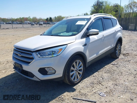 2017 Ford Escape Titanium with VIN 1FMCU9J96HUE21191, listed as a IAAI auction lot 42006013 with 71,786 mi miles. Bid and sale history available at carsss.com. Image 18.