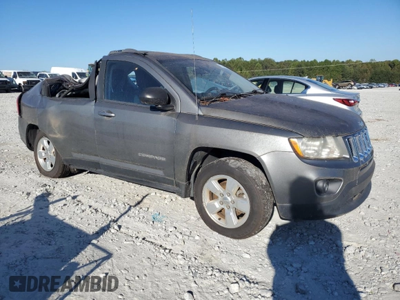 2013 Jeep Compass Sport with VIN 1C4NJCBA1DD131138, listed as a Copart auction lot 73746174 with 118,631 mi miles and Salvage Title. Bid and sale history available at carsss.com. Image 4.