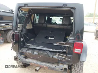 2015 Jeep Wrangler Unlimited Rubicon with VIN 1C4BJWFG7FL688728, listed as a IAAI auction lot 42054304 with 100,152 mi miles and . Bid and sale history available at DreamBid. Image 6.