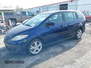 2010 Mazda 5 Sport with VIN JM1CR2W39A0388301, listed as a IAAI auction lot 42077549 with 128,371 mi miles and . Bid and sale history available at DreamBid. Image 2.