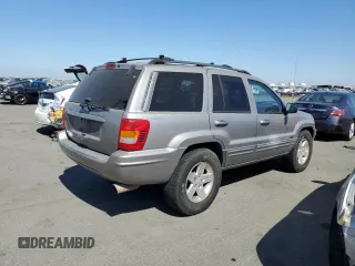 2001 Jeep Grand Cherokee Limited with VIN 1J4GW58S61C565685, listed as a Copart auction lot 73168374 with 252,978 mi miles and Clean Title. Bid and sale history available at carsss.com. Image 3.