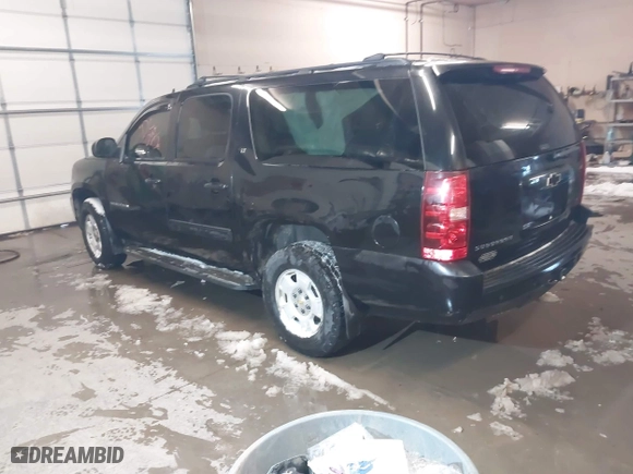 2010 Chevrolet Suburban LT with VIN 1GNUKJE33AR236764, listed as a IAAI auction lot 41447407 with 246,865 mi miles. Bid and sale history available at carsss.com. Image 3.