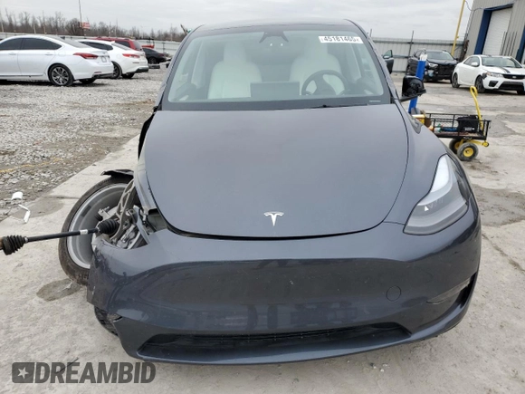 2023 Tesla Model Y Long Range z VIN 7SAYGDEE8PF884567, wystawiony jako Copart lot #45181465 z przebiegiem 16 653 mil mil oraz Szkoda całkowita • Salvage title. Historia ofert i sprzedaży dostępna na DreamBid. Obrazek 5.