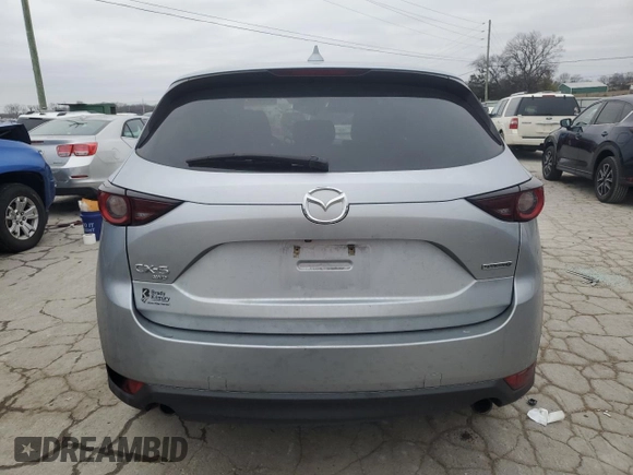 2020 Mazda CX-5 Touring z VIN JM3KFBCM2L0768348, wystawiony jako Copart lot #87813065 z przebiegiem Nie podano mil oraz Szkoda całkowita • Salvage title. Historia ofert i sprzedaży dostępna na DreamBid. Obrazek 6.