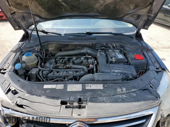 2012 Volkswagen CC Sport z VIN WVWMN7AN8CE509928, wystawiony jako Copart lot #62351985 z przebiegiem 183 475 mil mil oraz Szkoda całkowita • Salvage title. Historia ofert i sprzedaży dostępna na DreamBid. Obrazek 11.