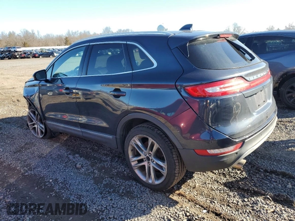 2015 Lincoln MKC with VIN 5LMTJ2AH0FUJ10888, listed as a Copart auction lot 48795445 with 123,437 mi miles and Salvage Title. Bid and sale history available at carsss.com. Image 2.