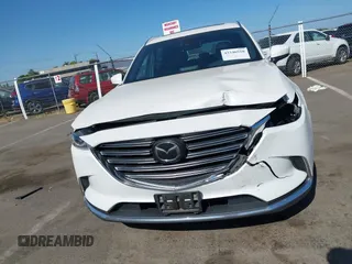2017 Mazda CX-9 Grand Touring with VIN JM3TCBDY3H0132351, listed as a IAAI auction lot 42346910 with 124,990 mi miles and . Bid and sale history available at DreamBid. Image 12.