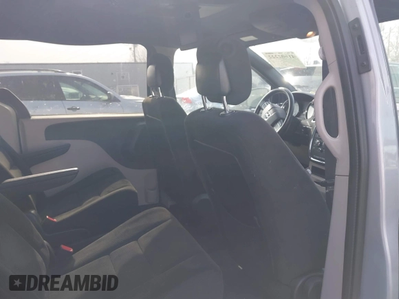 2015 Dodge Grand Caravan SE with VIN 2C4RDGBG3FR653239, listed as a IAAI auction lot 41607222 with 124,732 mi miles and . Bid and sale history available at DreamBid. Image 8.
