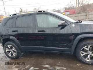 2017 Jeep Cherokee Trailhawk L Plus with VIN 1C4PJMBB9HW551506, listed as a IAAI auction lot 41650841 with 51,273 mi miles. Bid and sale history available at carsss.com. Image 14.