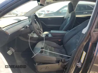 2022 Tesla Model Y Performance with VIN 7SAYGDEF1NF466938, listed as a Copart auction lot 53678045 with 50,135 mi miles and Salvage Title. Bid and sale history available at DreamBid. Image 7.
