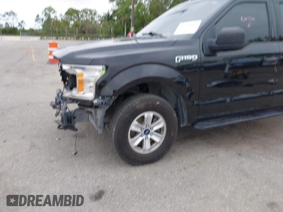 2019 Ford F-150 XL with VIN 1FTFW1E56KFB72035, listed as a IAAI auction lot 41974489 with 116,136 mi miles. Bid and sale history available at carsss.com. Image 6.
