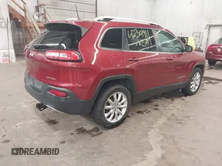 2016 Jeep Cherokee Limited with VIN 1C4PJMDB0GW337600, listed as a IAAI auction lot 42301911 with 163,441 mi miles and . Bid and sale history available at DreamBid. Image 4.
