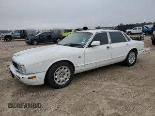 1998 Jaguar XJ with VIN SAJHX1248WC835728, listed as a Copart auction lot 86698244 with 116,768 mi miles and Clean Title. Bid and sale history available at DreamBid. Image 1.