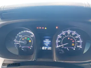 2016 Toyota Avalon Hybrid XLE Premium with VIN 4T1BD1EB2GU048496, listed as a IAAI auction lot 42047633 with 68,900 mi miles. Bid and sale history available at carsss.com. Image 7.