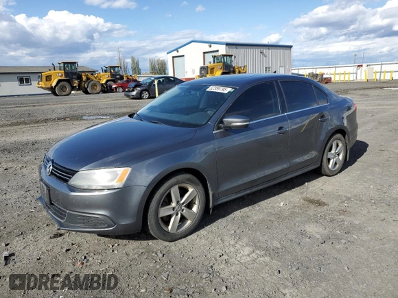 2014 Volkswagen Jetta TDI w/Premium with VIN 3VW3L7AJ4EM273755, listed as a Copart auction lot 52389795 with 184,586 mi miles and Salvage title. Bid and sale history available at DreamBid. Image 1.
