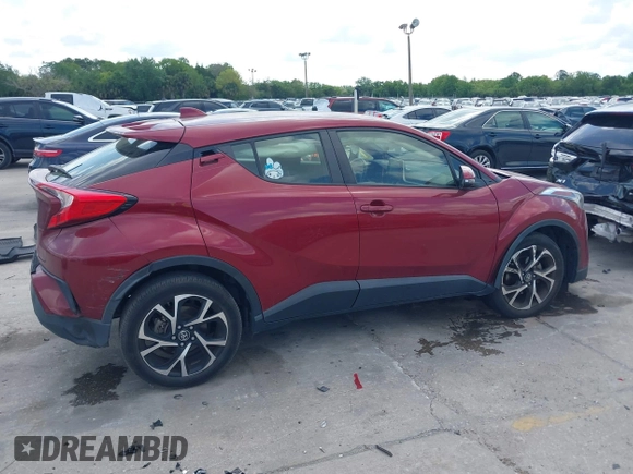 2019 Toyota C-HR XLE with VIN JTNKHMBX0K1017215, listed as a IAAI auction lot 41898189 with 74,239 mi miles. Bid and sale history available at carsss.com. Image 13.