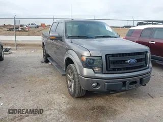 2014 Ford F-150 XL with VIN 1FTFW1EFXEKF21377, listed as a IAAI auction lot 42133053 with 99,924 mi miles and . Bid and sale history available at DreamBid. Image 1.