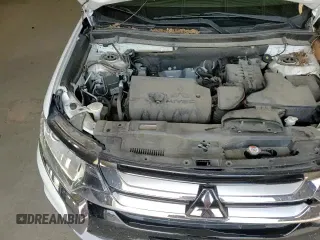 2018 Mitsubishi Outlander ES z VIN JA4AZ3A35JZ044698, wystawiony jako Copart lot #66407095 z przebiegiem 86 531 mil mil oraz Szkoda całkowita • Salvage title. Historia ofert i sprzedaży dostępna na DreamBid. Obrazek 16.