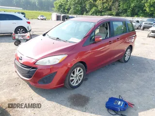 2014 Mazda 5 Sport with VIN JM1CW2BL6E0168411, listed as a IAAI auction lot 42414603 with 149,688 mi miles and . Bid and sale history available at DreamBid. Image 2.
