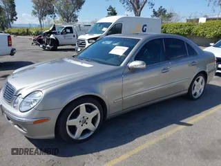 2003 Mercedes-Benz E-Class 3.2L with VIN WDBUF65J63X103423, listed as a IAAI auction lot 41937358 with 151,439 mi miles. Bid and sale history available at carsss.com. Image 2.