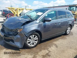 2014 Honda Odyssey EX-L with VIN 5FNRL5H60EB117218, listed as a IAAI auction lot 42201739 with 184,586 mi miles and . Bid and sale history available at DreamBid. Image 17.