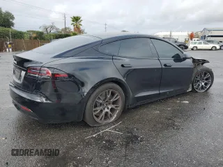 2024 Tesla Model S with VIN 5YJSA1E54RF536092, listed as a Copart auction lot 85934334 with 11,451 mi miles and Salvage title. Bid and sale history available at DreamBid. Image 3.