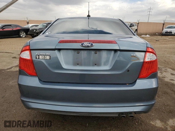 2012 Ford Fusion SE with VIN 3FAHP0HA2CR124891, listed as a Copart auction lot 76113714 with 184,628 mi miles and Salvage title. Bid and sale history available at DreamBid. Image 6.
