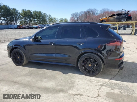 2016 Porsche Cayenne GTS z VIN WP1AD2A26GLA70890, wystawiony jako Copart lot #50872165 z przebiegiem 95 585 mil mil oraz Tytuł czysty. Historia ofert i sprzedaży dostępna na DreamBid. Obrazek 2.