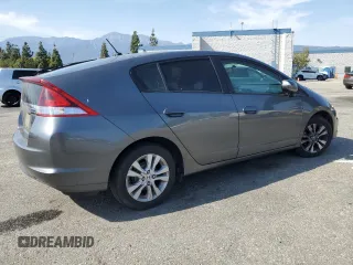 2012 Honda Insight EX z VIN JHMZE2H77CS002907, wystawiony jako Copart lot #52040465 z przebiegiem 158 266 mil mil oraz Szkoda całkowita • Salvage title. Historia ofert i sprzedaży dostępna na DreamBid. Obrazek 3.