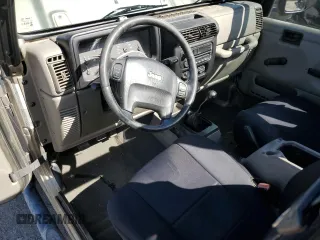 2006 Jeep Wrangler Rubicon with VIN 1J4FA69S36P744801, listed as a Copart auction lot 46541575 with 164,347 mi miles and Salvage title. Bid and sale history available at DreamBid. Image 8.