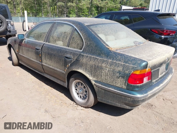 1997 BMW 5 Series 528iA with VIN WBADD6329VBW04841, listed as a IAAI auction lot 42038507 with 147,762 mi miles. Bid and sale history available at carsss.com. Image 3.