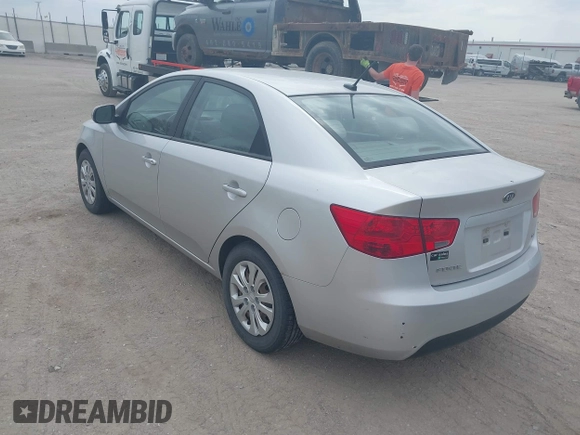 2012 Kia Forte EX with VIN KNAFU4A25C5591601, listed as a IAAI auction lot 42071351 with 120,636 mi miles. Bid and sale history available at carsss.com. Image 3.