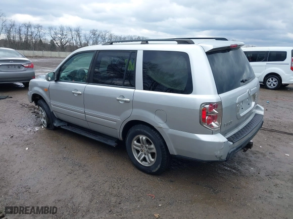 2006 Honda Pilot EX with VIN 2HKYF18426H553632, listed as a IAAI auction lot 41656610 with 154,470 mi miles. Bid and sale history available at carsss.com. Image 3.